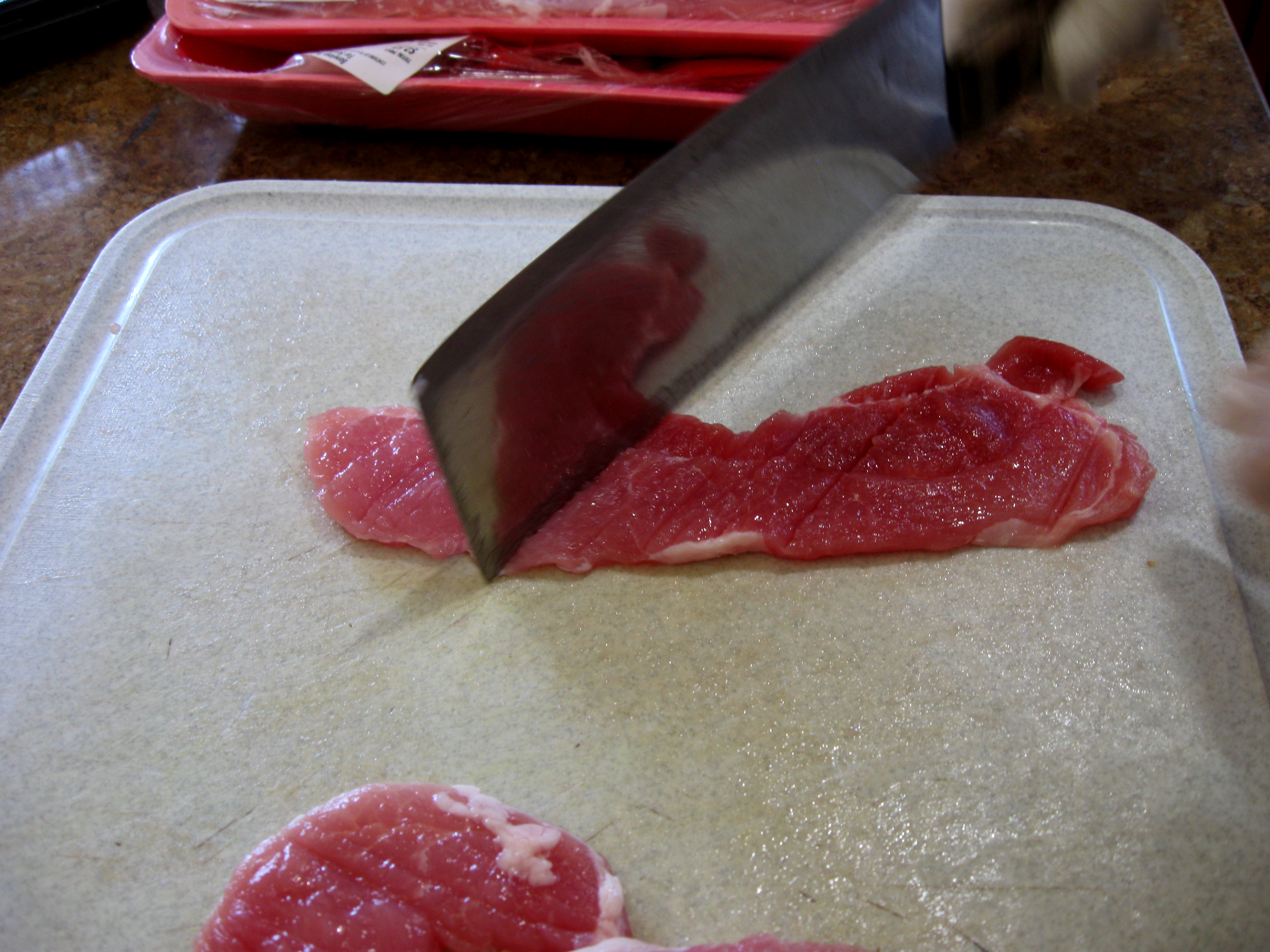 Pound with back edge of knife